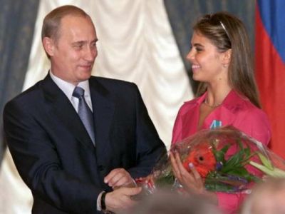 Владимир Путин и Алина Кабаева. Фото skuky.net Владимир Путин и Алина Кабаева. Фото skuky.net