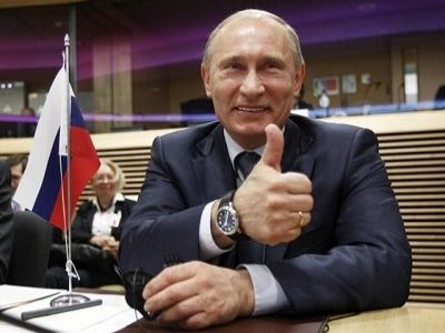 Радостный Путин. Фото: knack.be